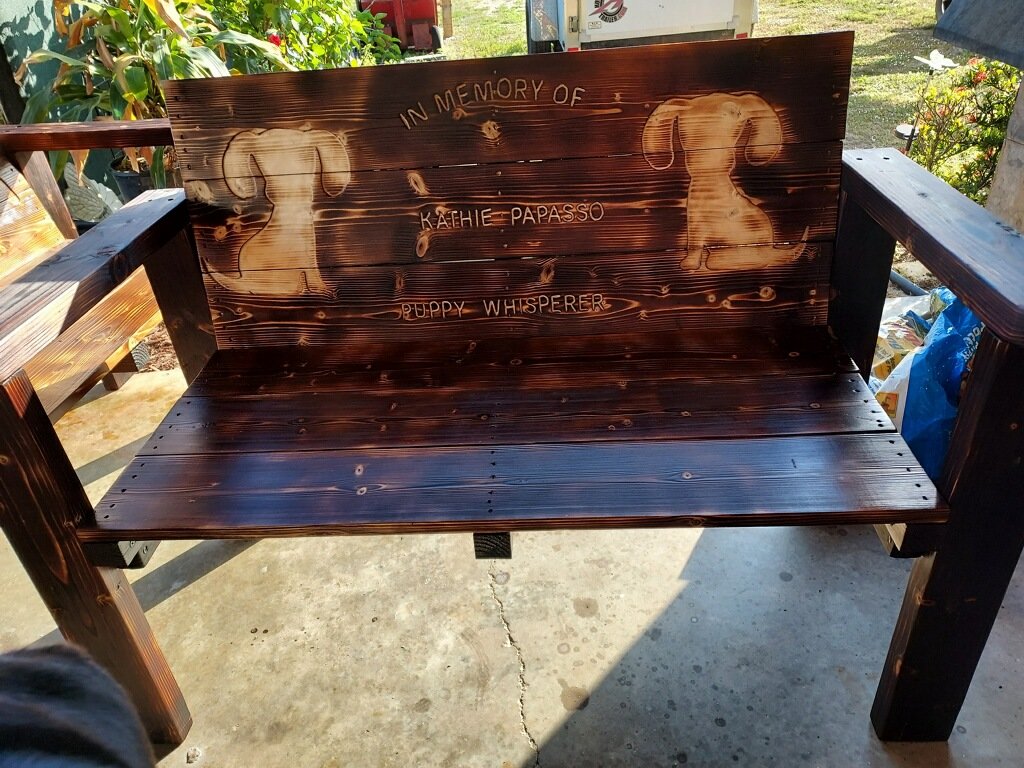 Two benches were handcrafted in memory of Kathie Papasso and Diane Thrift by Steve Gilliland